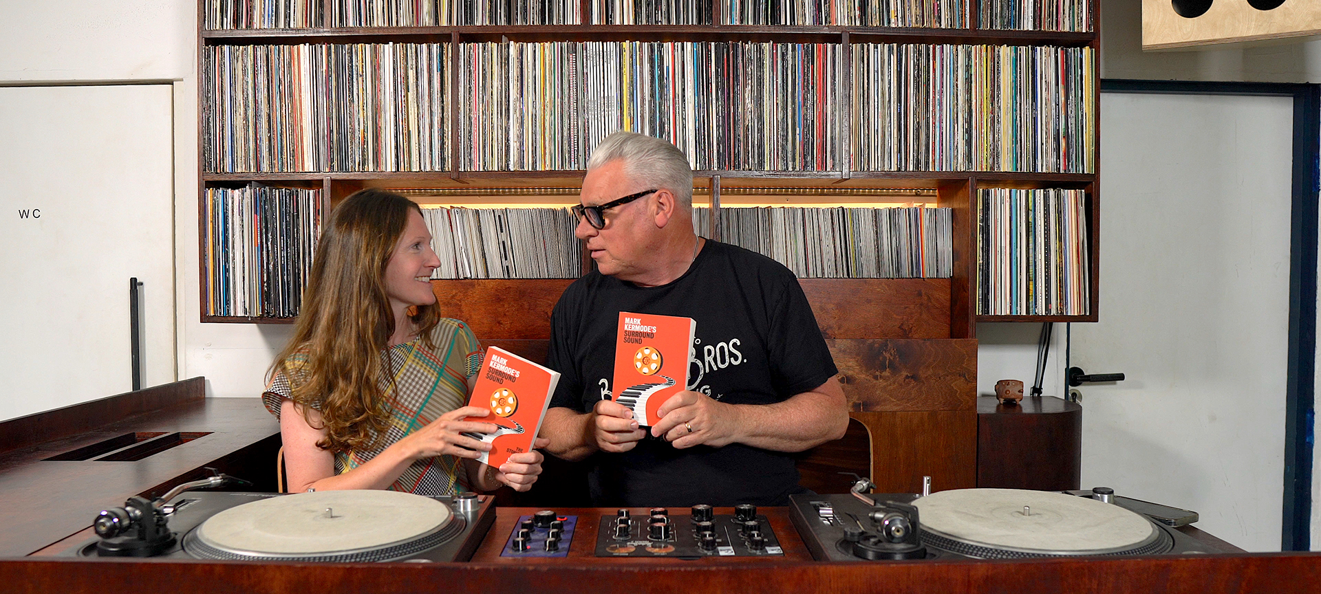 mark kermode and jenny nelson holding copies of their book