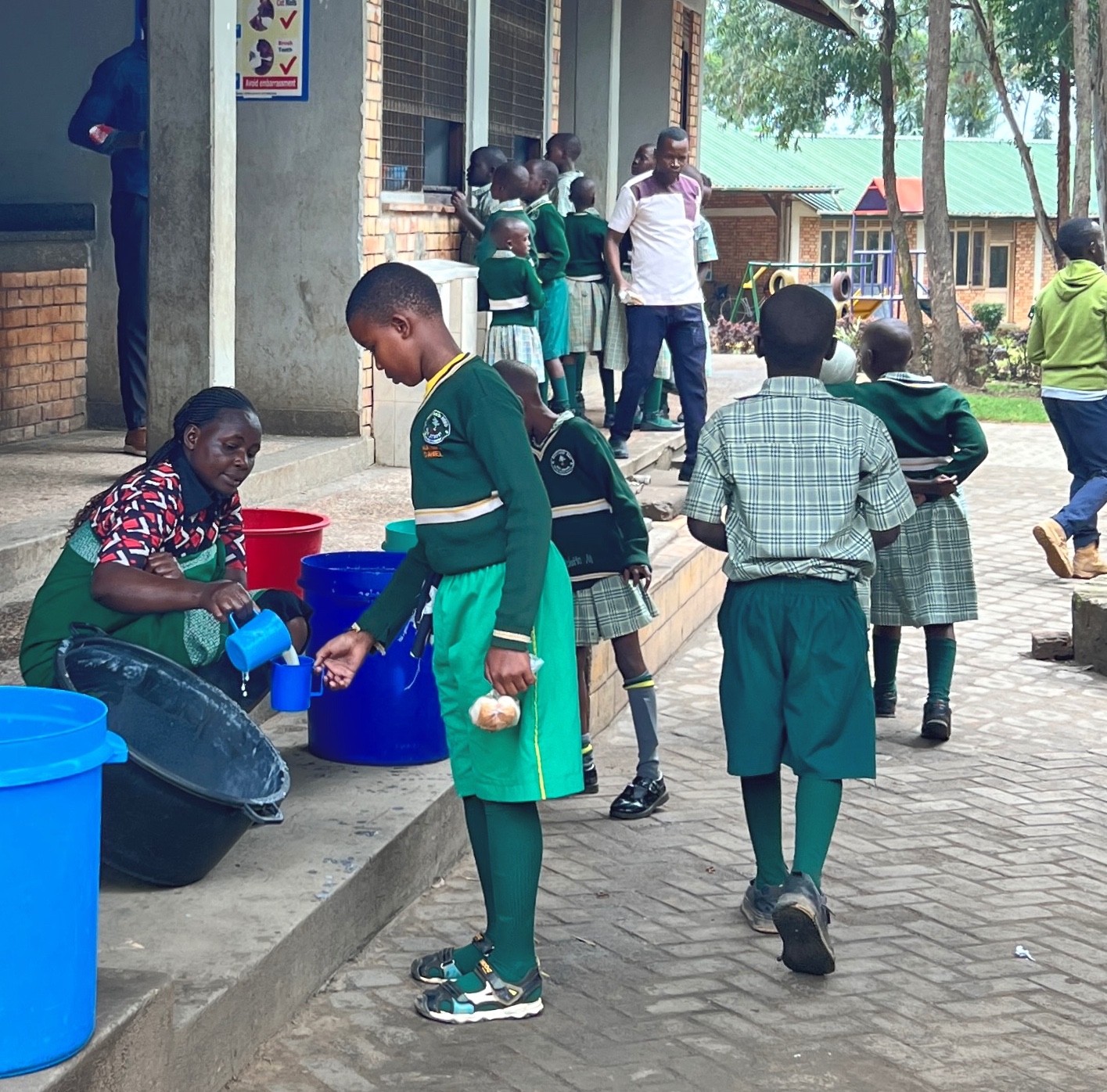 A 20,000 liter water tank on a high tower that looks damaged