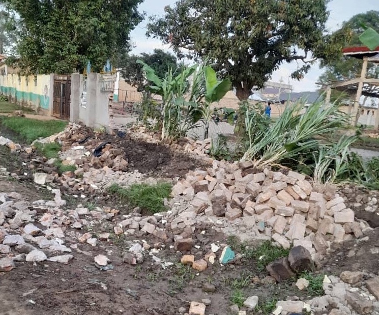 A section of brick wall/fence around the Nursery School collapsed. The pic shows the rubble. 