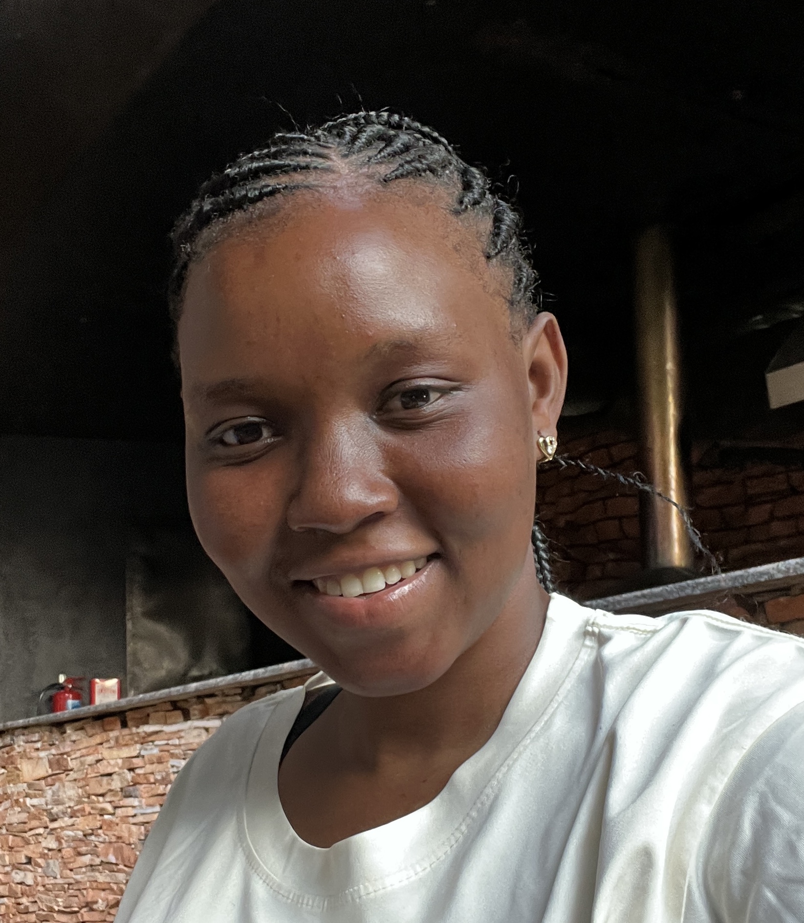 Close-up of a radiant young Ugandan woman