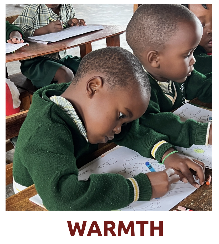 Three young Ugandan men with an older man with beautiful trees and shrubs in the background