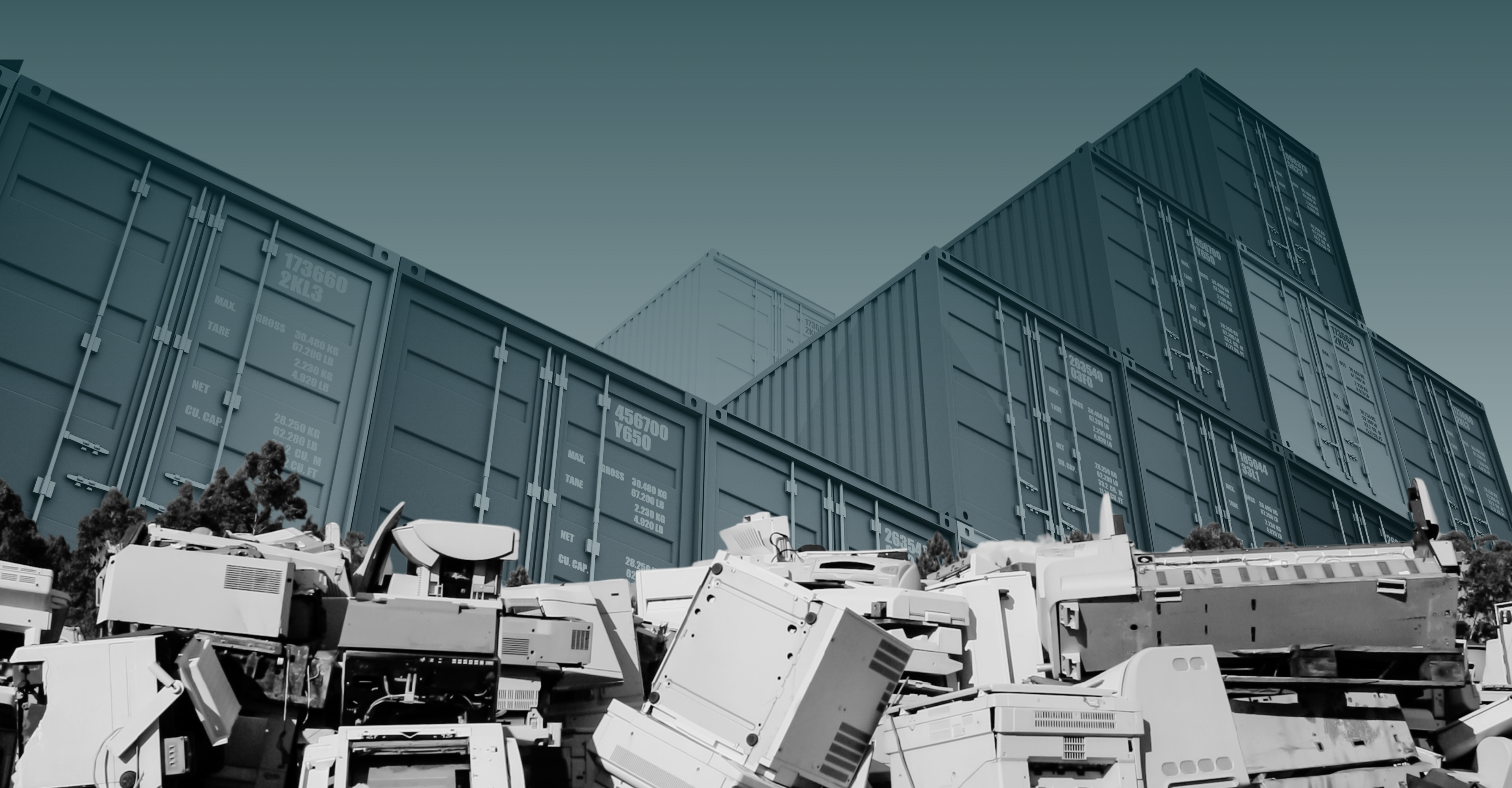 A large landfill site with waste piled high, surrounded by garbage trucks and excavators. 