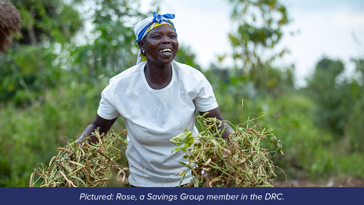 A Savings Group member in Uganda at work cutting a block of soap